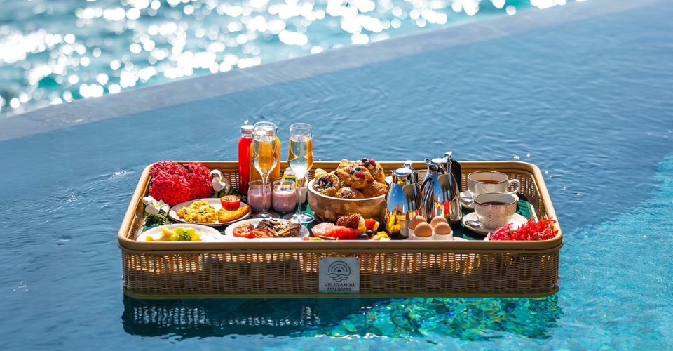 Floating pool breakfast at Veligandu Maldives