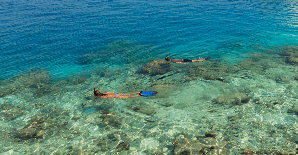 Couple Snorkeling at Veligandu
