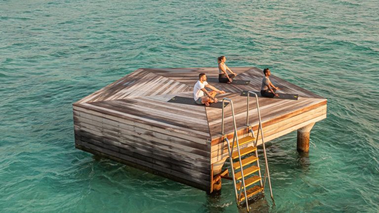 Sunrise Yoga at the 360-Ocean Platform at Veligandu Maldives